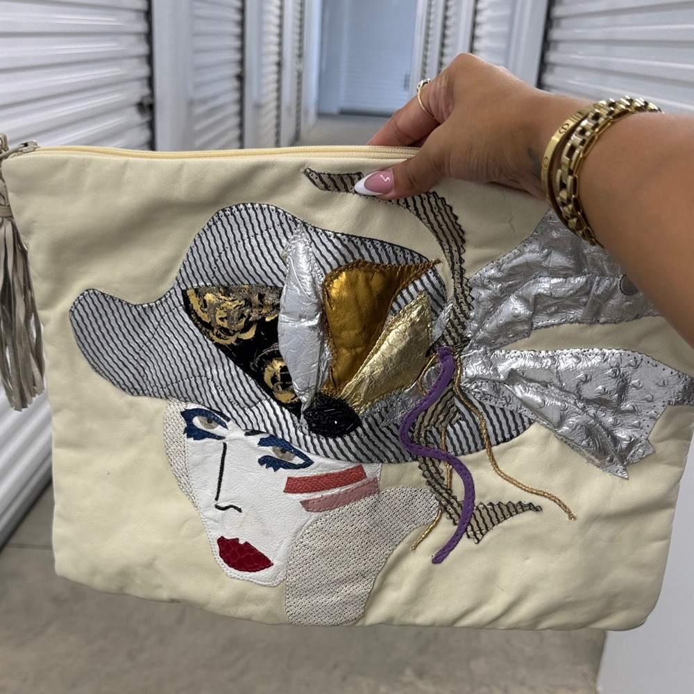 Artistic Face Design Clutch in Cream with Gold and Silver Accents
